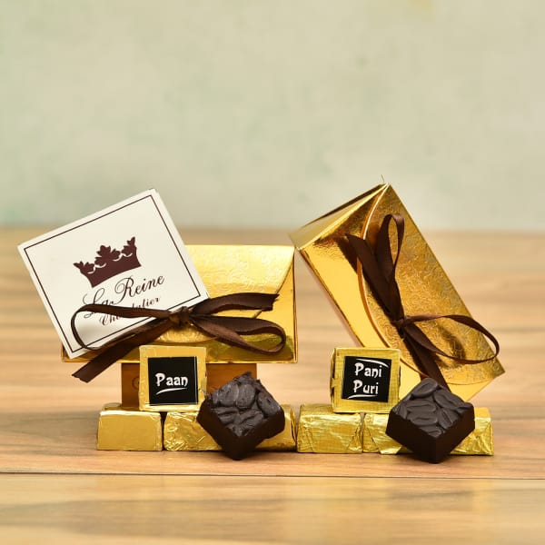 Flavored Chocolates in Golden Pouch with Ribbon
