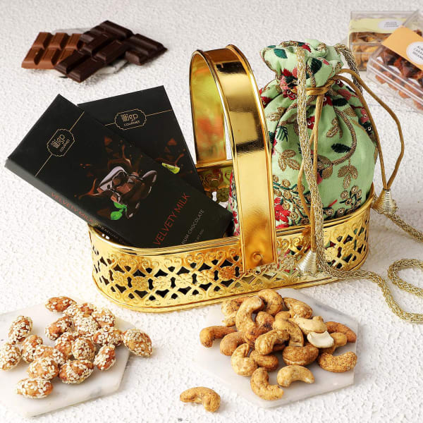 Flavoured Dry Fruits And Chocolates In Metal Basket