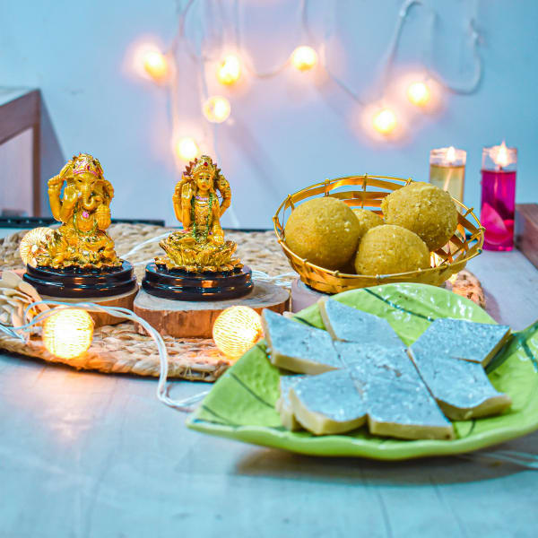 Ganesha & Laxmi Idols with Sweets and Candles