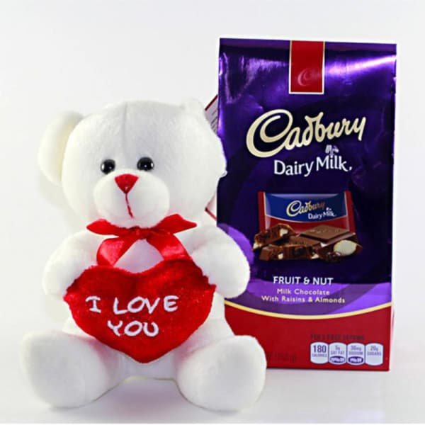 teddy bear holding chocolate