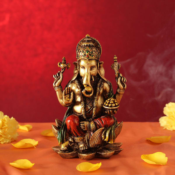 Lord Ganesha Idol Sitting on Lotus Flower