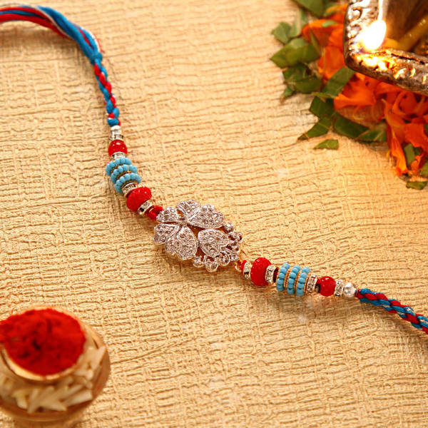 Metallic Floral Heart Shaped Rakhi Gift/Send Rakhi Gifts Online