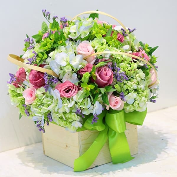 Mixed bouquet in container
