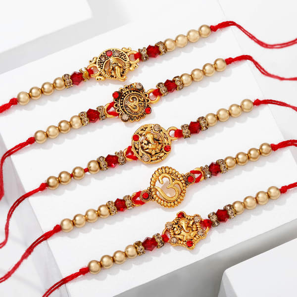 Om & Ganesha Metal Rakhi with CZ Stones