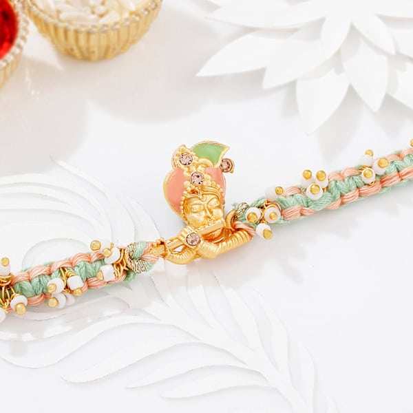 Pastel Krishna Macrame Rakhi With Meena Work