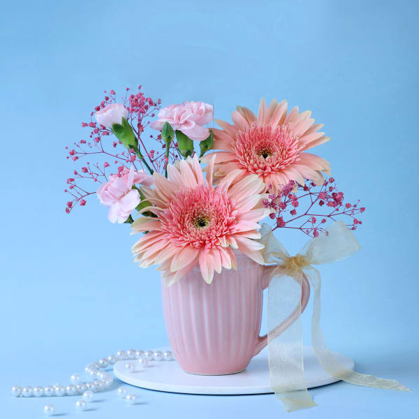 Peach and Pink Flowers in a Mug