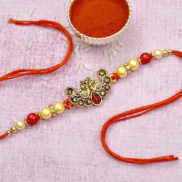 Peacock Rakhi With Stones & Pearls: Gift/Send Rakhi Gifts Online ...