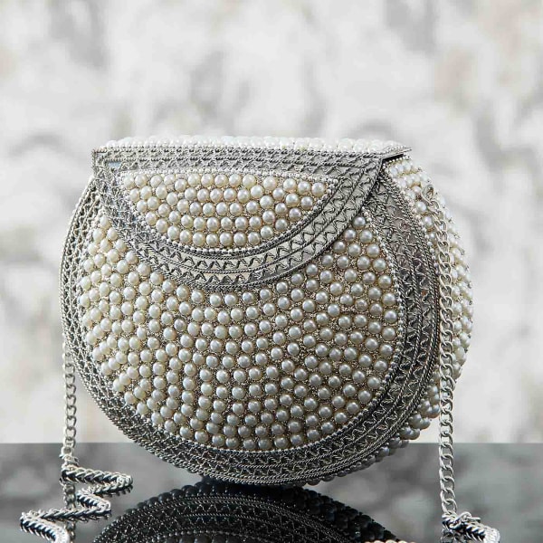 silver studded clutch