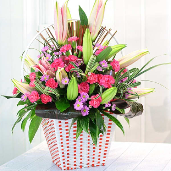 Pink & Purple bouquet in container