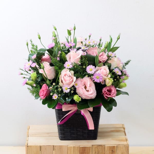Pink tonings Flowers in Basket