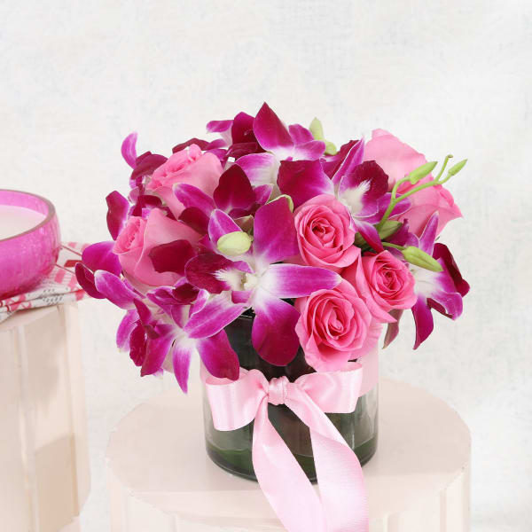 Purple Orchids & Pink Roses In Round Vase