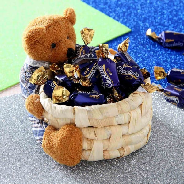 teddy in basket