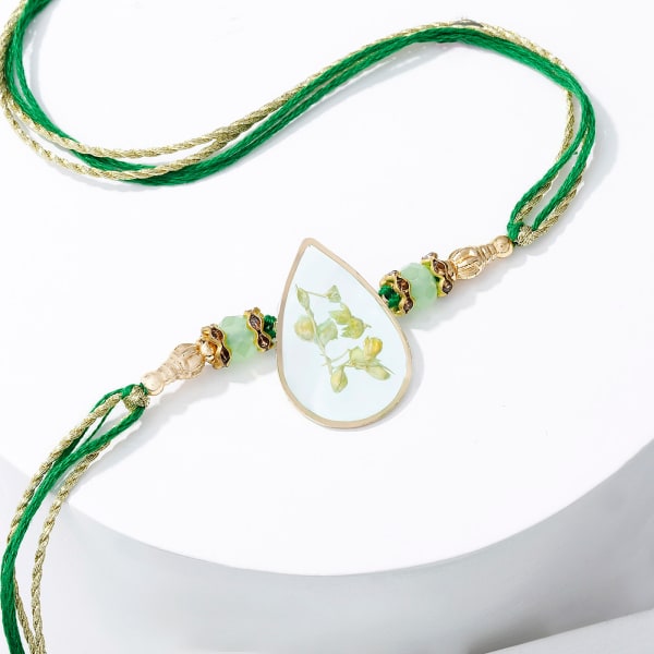 Rakhi with Natural Flowers & Resins Gift/Send Rakhi Gifts Online
