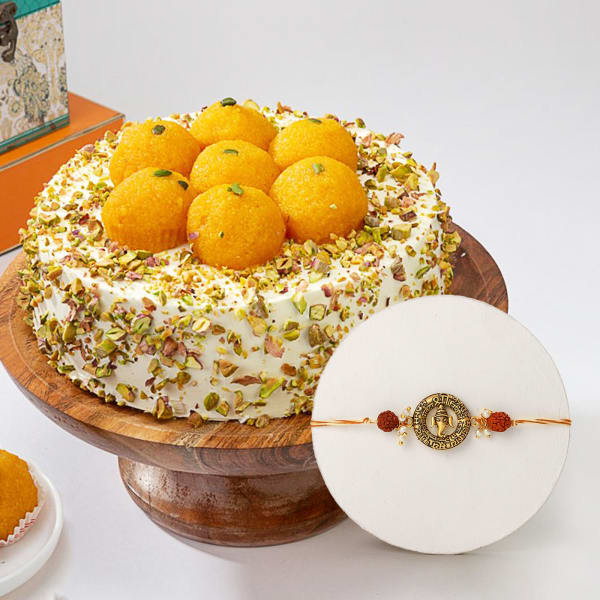 Rudraksha Beads And Ganesha Rakhi With Motichoor Ladoo Cake