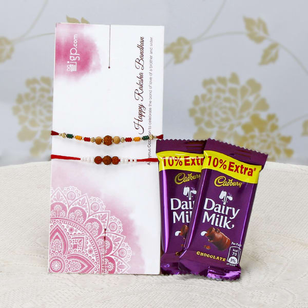 Set of 2 Stunning Rakhis with 2 Bars Of Dairy Milk Chocolates