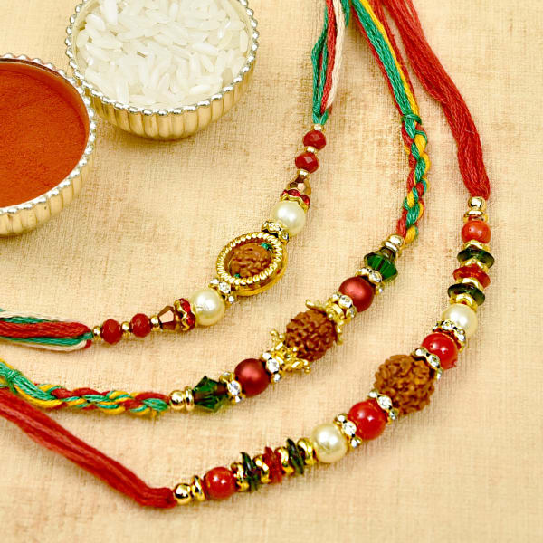 Oval Shape White Ring Rudrakhsa Rakhi thread Orange and Red Color Thread Set of Two Rakhi Raksha bandhan Gift for your Brother Color Vary and Multi Design