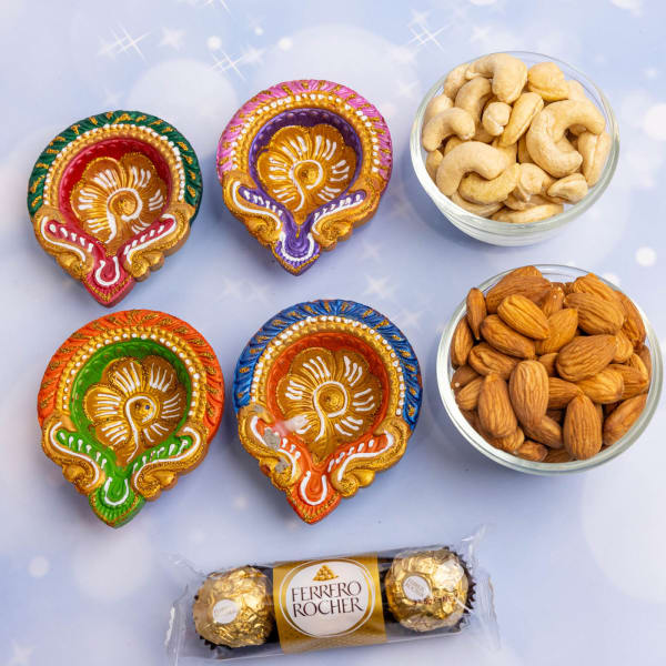 Set of 4 diyas with dryfruits and Rocher