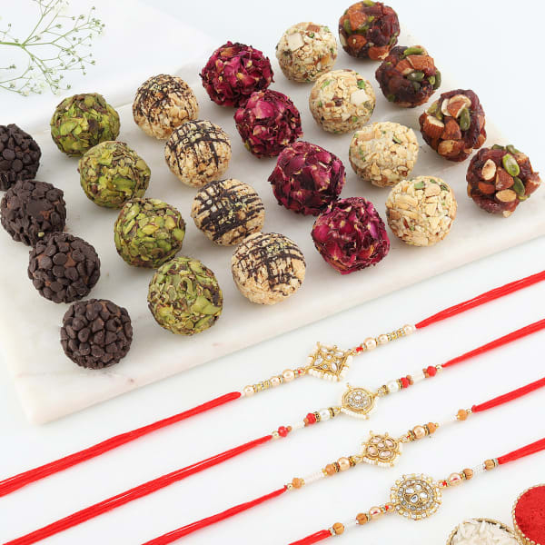 Set of 4 Rakhis With Dry Fruit Sweets