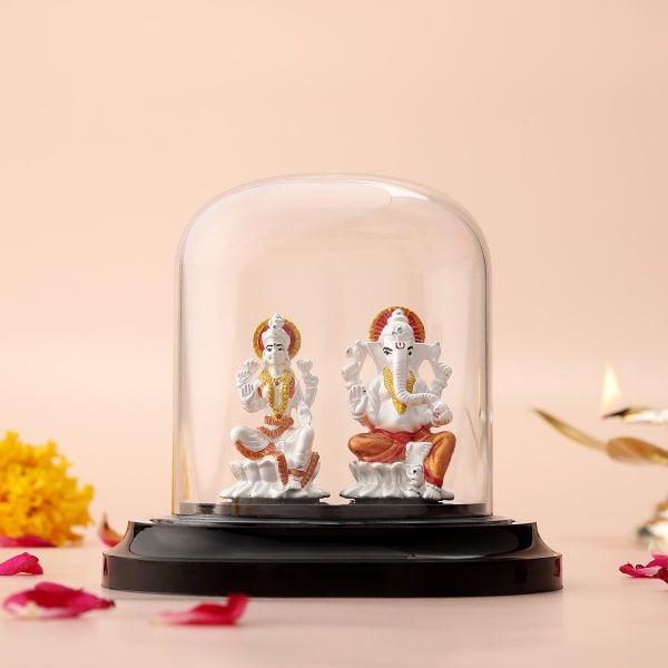 Silver Laxmi and Ganesh Idols in Glass Dome