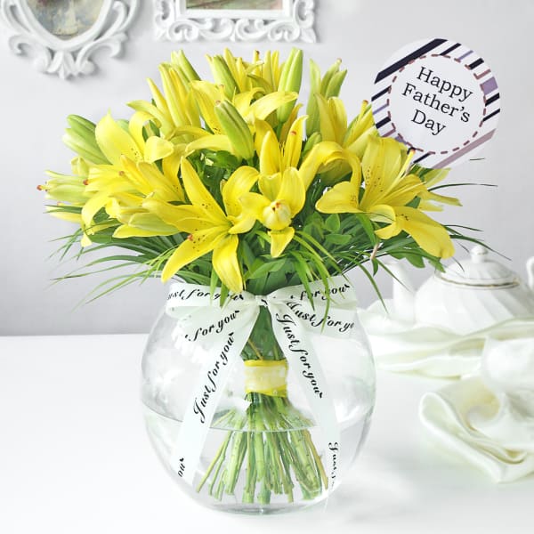 Spring Lilies in Fish Bowl Vase for Father's Day