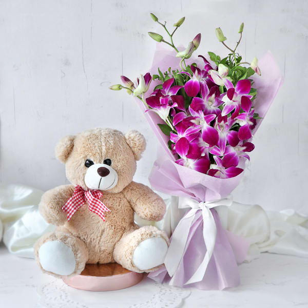 Sublime Orchids Bouquet with Teddy  (12 inch)