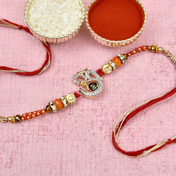 Traditional Om with Shivling Rakhi Curated by Gold & Red Beads: Gift ...