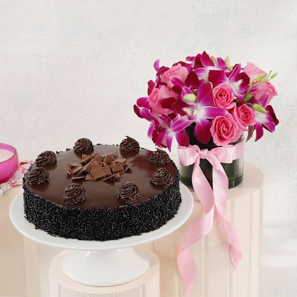 Truffle Delight Cake With Bunch Of Roses And Orchids