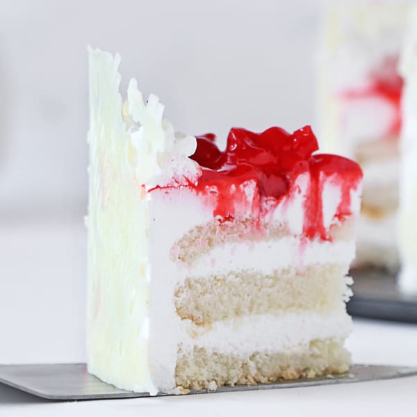 Order Vanilla Cake with Cherry Toppings Half Kg Online at Best Price
