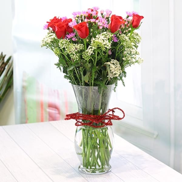 Vase of roses & seasonal flowers