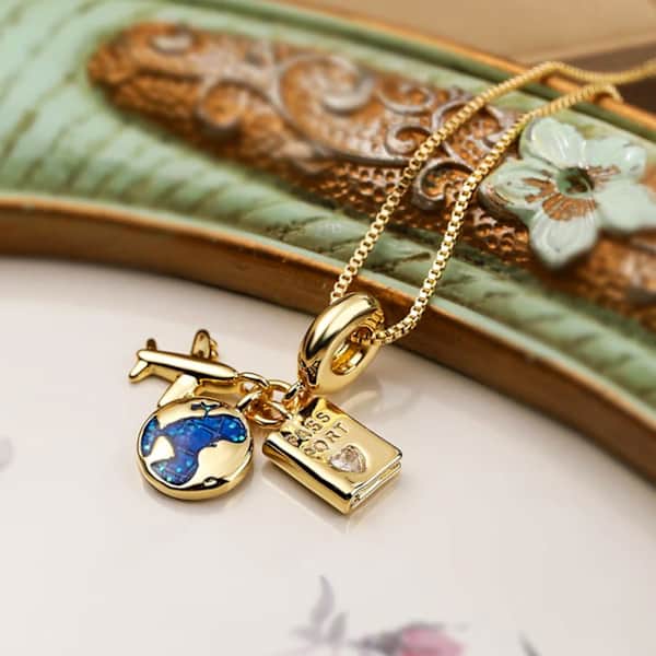 Wanderlust In Gold Travel Charm Necklace