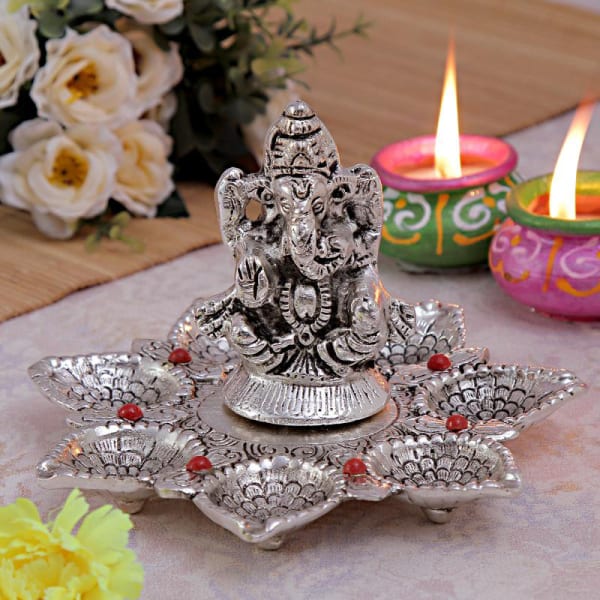 White Metallic Ganesha Seven Batti Diya