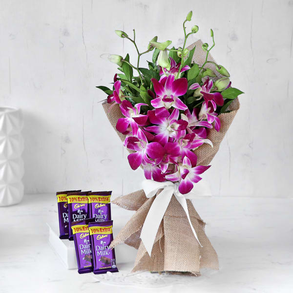 Wonderful Orchids Bouquet with Cadbury Dairy Milk Bars (5 pcs)