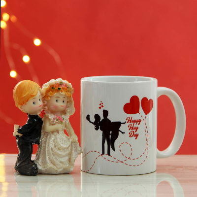 Adorable Love Couple with Mug for Hug Day: Gift/Send Valentine's Day Gifts Online J11079843 |IGP.com