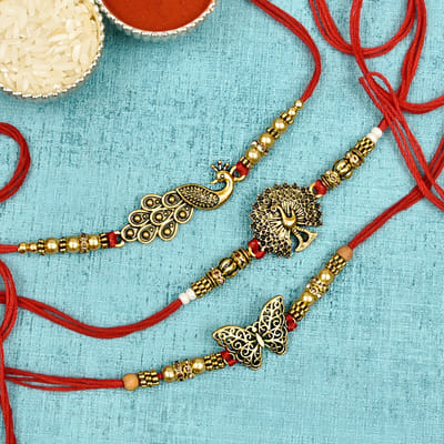 Antique Finish Peacocok and Butterfly Designer Rakhi Set of Three