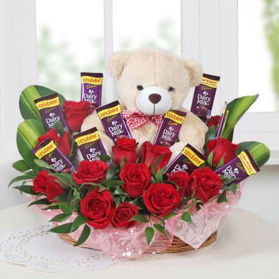 teddy bear with chocolate basket