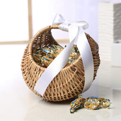 Butter Toffees in a Cane Basket: Gift/Send Gourmet Gifts Online M11020384 | IGP.com