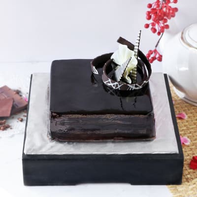 Square Chocolate Cake With Chocolate Glaze Chocolate Shape And Ferrero On  Top | Medcakes