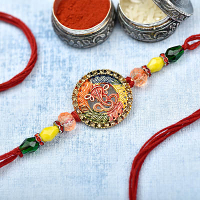 Colorful Ganesha Om With Crystal Beads & Stone Rakhi: Gift/Send Rakhi ...