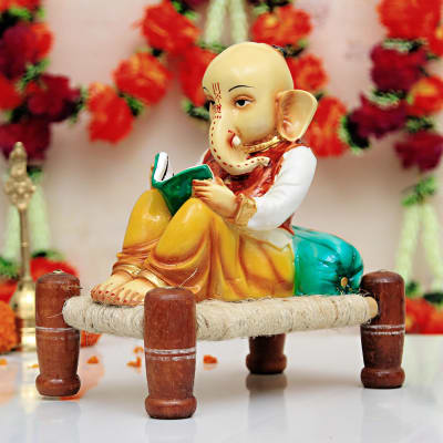 Cute Lord Ganesha Reading a Book Idol: Gift/Send Home and Living Gifts  Online CC1041595 |IGP.com