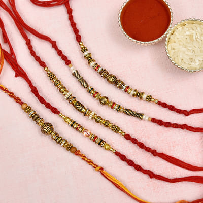 Designer Metallic Beads and Colored Stone Embellished Set of Five Rakhis