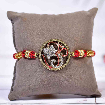 Designer Om Ganesha Dial AD Rakhi: Gift/Send Rakhi Gifts Online ...