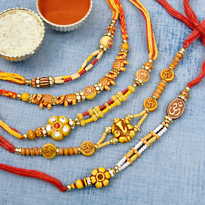 Divine Set of 5 Om Beads and Ganesha Rakhi