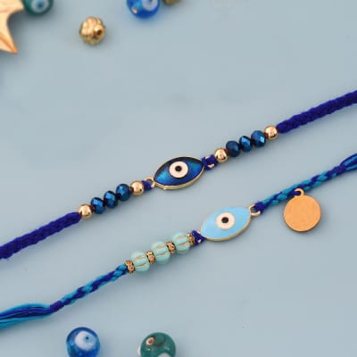 Buy/Send Evil Eye Meena Rakhi Set of 2 Online | IGP | JVS1261684