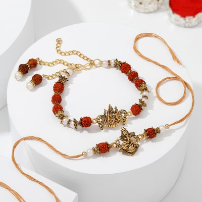 Buy/Send Ganesh And Lakshmi Antique Bhaiya Bhabhi Rakhi Online | IGP ...