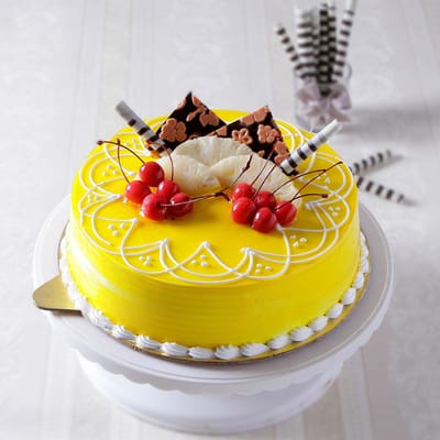 Order Half Kg Round Pineapple Cake With Cherry Toppings Online At Best Price Free Delivery Igp Cakes