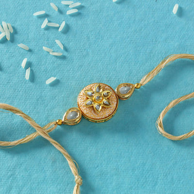 Kundan Rakhi with Peach Meena Work