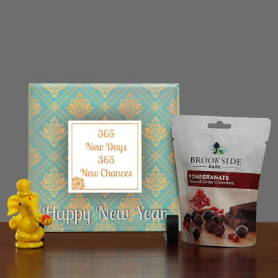 New Year Tile With Brookside Dark Chocolates And Cute Ganesha Idol New Year Tile With Brookside Dark Chocolates And Cute Ganesha Idol