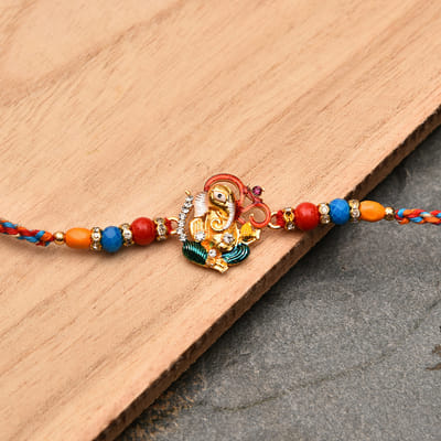 Om Ganesha Metallic Beaded Rakhi