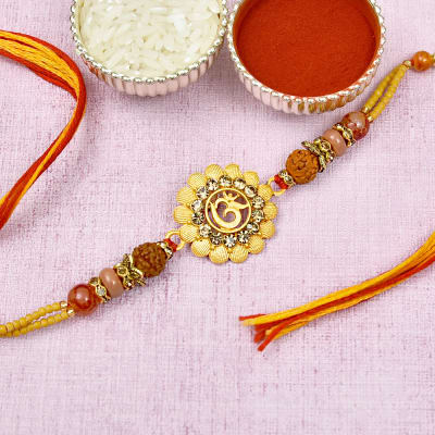 Om Rakhi with Rudrakhsha and Beads Finishing: Gift/Send Rakhi Gifts ...