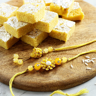 Yellow Pachhi work Bhaiya-Bhabhi Rakhi with Moong Dal Barfi